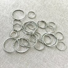 Load image into Gallery viewer, Textured Nickel Plated Silver Round CIrcle Links - 10mm to 20mm - Nickel Silver Plated - Package of 27 Links - The Attic Exchange