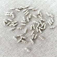 Load image into Gallery viewer, Double Line Silver Beads - Beadalon - 6mm - Silver Plated - Package of 61 Beads - The Attic Exchange