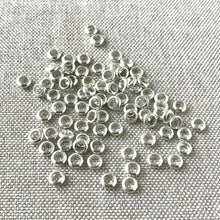 Load image into Gallery viewer, Shiny Silver Plated Circle Spacer Beads - 4mm - Circle - Silver Plated - Package of 80 Beads - The Attic Exchange