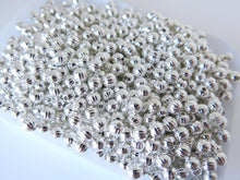 Load image into Gallery viewer, Spacer Beads - Metal Beads - Corrugated Rounds - Silver Plated - 6mm - 8 oz bag package - The Attic Exchange