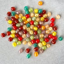 Load image into Gallery viewer, Colorful round crackle acrylic beads in assorted colors scattered on a gray surface, matching the product Bead mix crackle acrylic - assorted colors - 12mm round - Pack of 100.