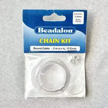 Load image into Gallery viewer, Beadalon Chain Kit - 0.9mm Round Cable - Silver Plated - 2-Meters packaged with clear spool and small jewelry clasps for crafting and jewelry making projects.