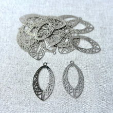 Load image into Gallery viewer, Drop, Lazer Lace™, silver-finished brass, 29x17mm fancy open marquise pieces displayed on a neutral fabric background, sold per pkg of 20.