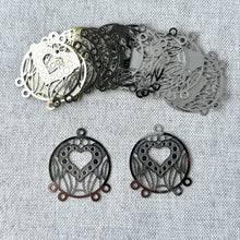 Load image into Gallery viewer, Drop, Lazer Lace™, silver-finished brass, 22mm round with heart, 4 loops. Sold per pkg of 20, delicate round charms with heart cutout and lace pattern, ideal for jewelry making.