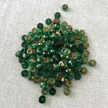 Load image into Gallery viewer, Gold Emerald Green Czech Glass Faceted Rondelle - 6mm - Gold and Emerald Green - Package of 112 Beads - The Attic Exchange