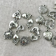 Load image into Gallery viewer, Silver Heart Charm Mix - Tibetan Silver - Mixed Sizes - Package of 22 Charms - The Attic Exchange