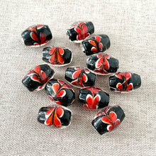 Load image into Gallery viewer, Black and Red Feather Glass Beads - Oval - 12mm x 15mm - Package of 12 Beads - The Attic Exchange