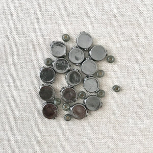 Oxidized Silver Color Puffed Disk Beads - Gunmetal - 11mm - Package of 14 and spacer seed beads - The Attic Exchange