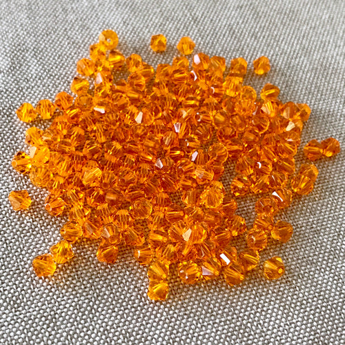 4mm Sun Swarovski Bicone Crystals - Sun Orange - Pack of 174 Crystals - The Attic Exchange
