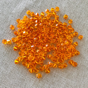 4mm Sun Swarovski Bicone Crystals - Sun Orange - Pack of 174 Crystals - The Attic Exchange