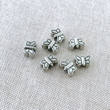 Load image into Gallery viewer, Tibetan Silver Butterfly Beads - Antique Silver - 8mm x 6mm - Vertical Drill - Package of 7 Beads - The Attic Exchange