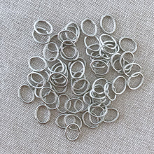 Load image into Gallery viewer, 8mm Steel Silver Oval Jumprings - 8mm x 5mm - Oval - Steel - Package of 54 Jump Rings - The Attic Exchange