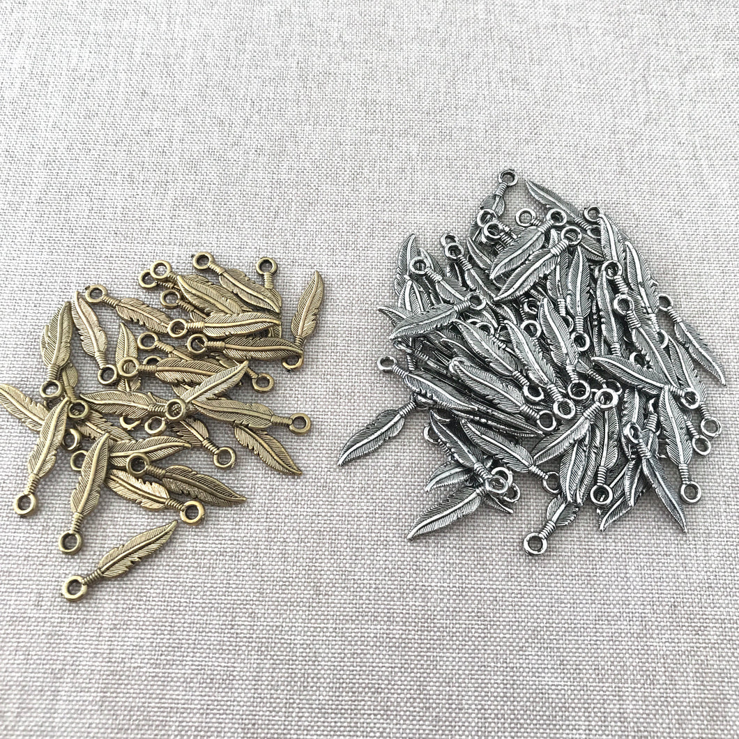 Silver and Gold Plated Feather Charms - Silver Plated, Gold Plated - 22mm - Feathers - Package of 31 Gold and 82 Silver Charms - The Attic Exchange
