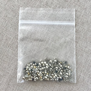 Silver Plated Crimp Bead Mix - Assorted Sizes - Package of 4 grams of beads - The Attic Exchange
