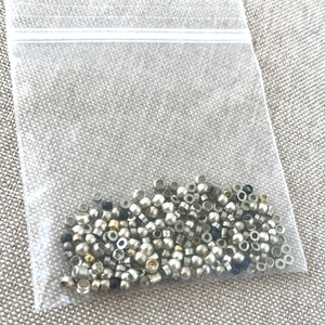 Silver Plated Crimp Bead Mix - Assorted Sizes - Package of 4 grams of beads - The Attic Exchange