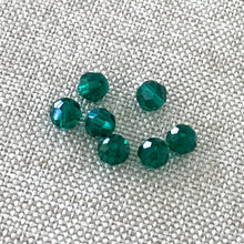 Load image into Gallery viewer, 4mm Emerald Green - Swarovski Round Crystals - Package of 7 - The Attic Exchange